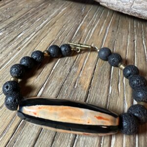 Black-and-Orange--gate-with-Lava-Rock-and-Brass-Bracelet